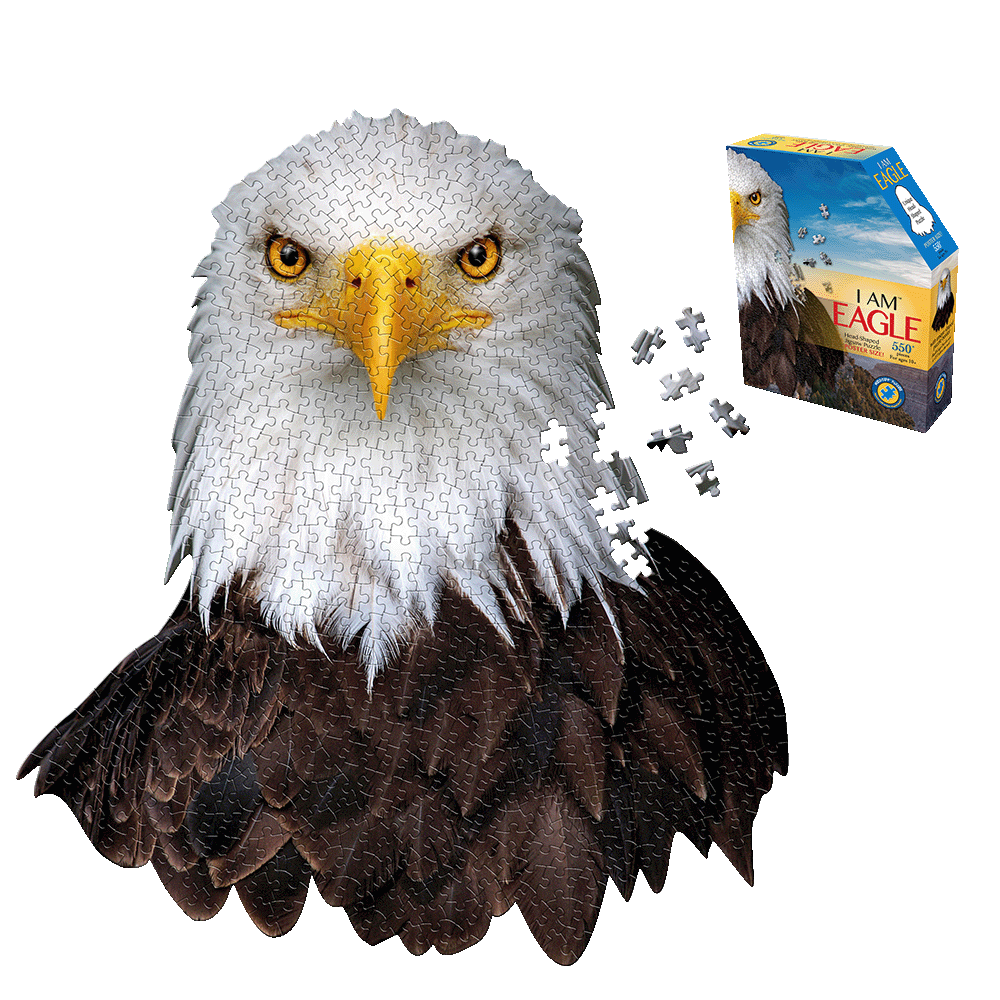 Madd Capp I AM EAGLE 550-piece jigsaw puzzle shown assembled as eagle head with white and yellow face and dark brown body, with loose puzzle pieces and blue pro