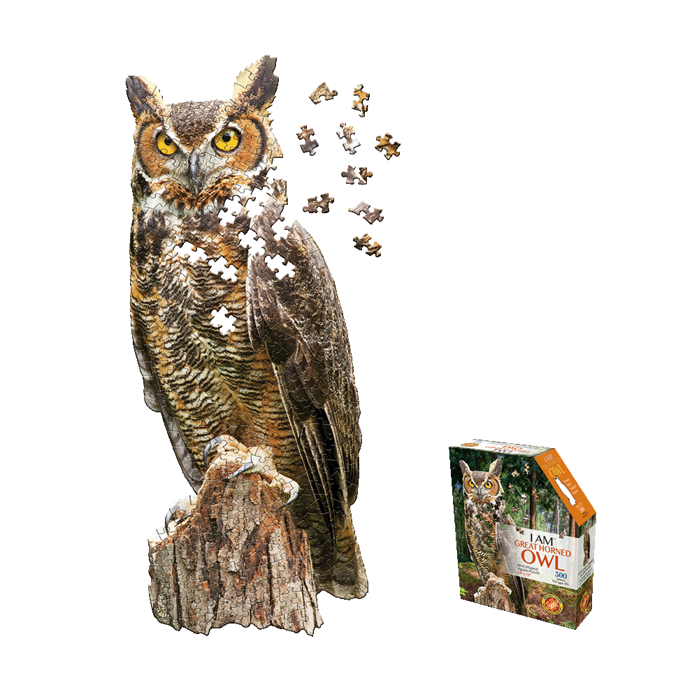 Great Horned Owl jigsaw puzzle showing assembled owl perched on tree stump with loose puzzle pieces floating, next to product box