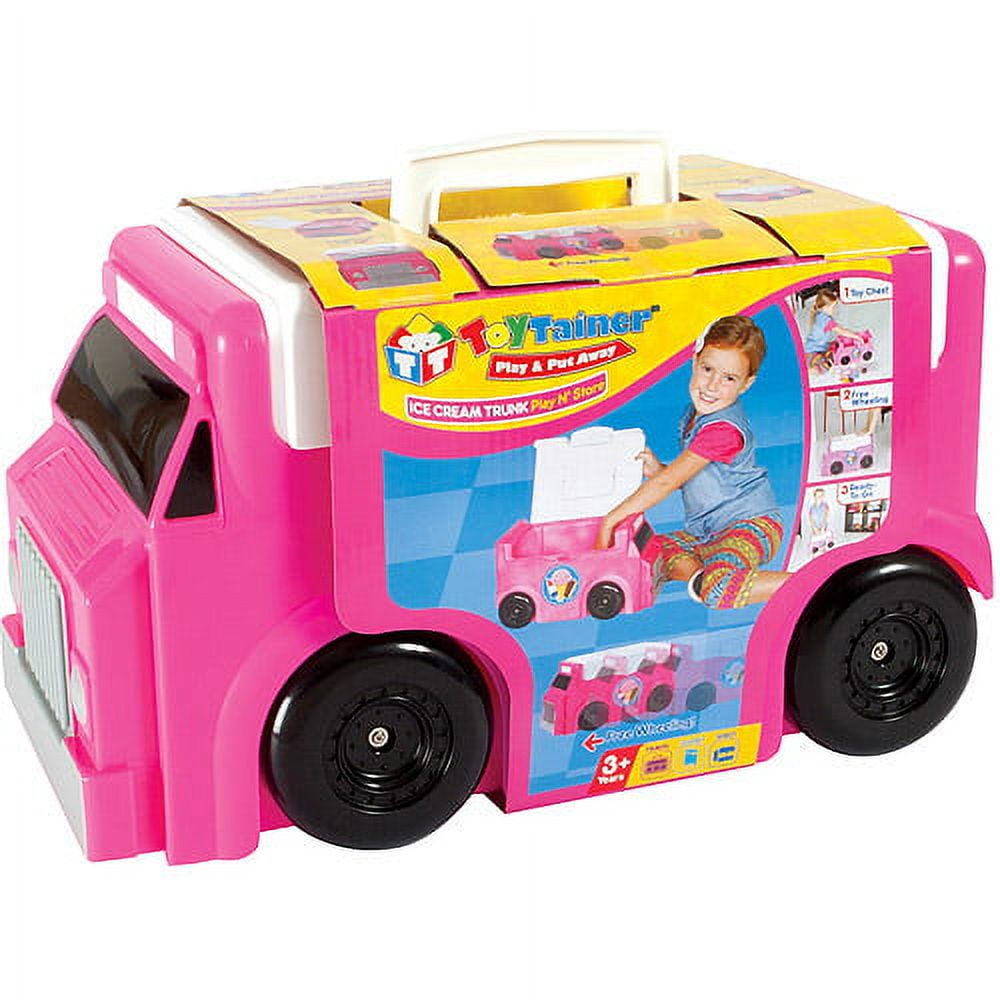 Bright pink ice cream truck playset with yellow roof, black wheels, opening door and service window, displayed on plain background