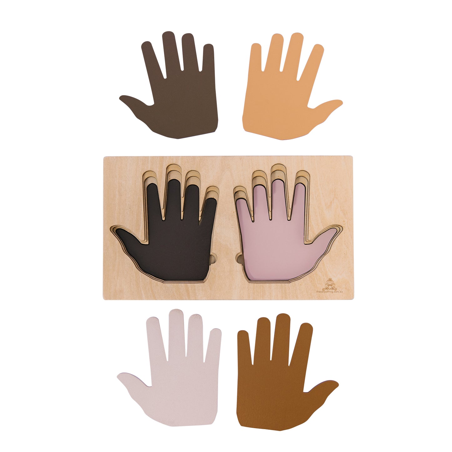 Wooden puzzle with six hand-shaped pieces in different skin tones: dark brown, light tan, pink, and caramel, displayed on a natural wood board with two pieces s