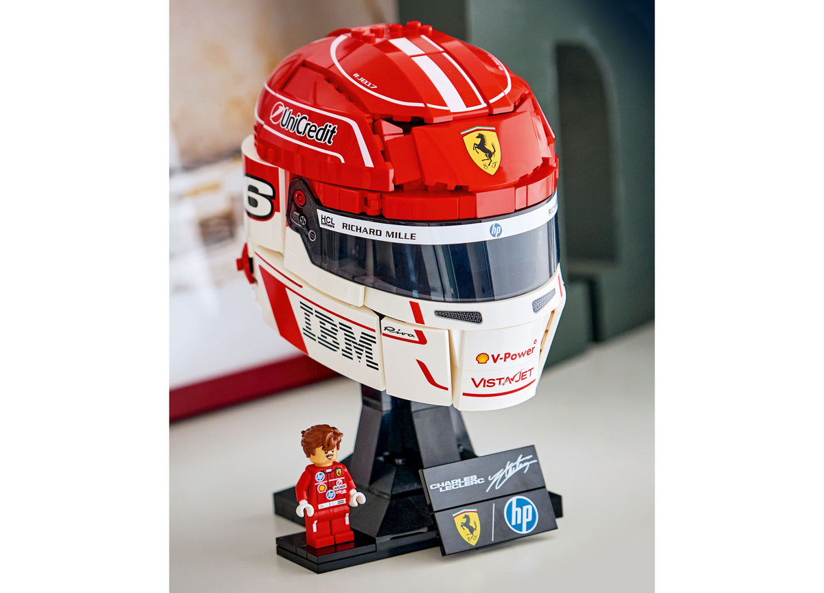 LEGO Ferrari Charles Leclerc Helmet Building Set with red racing helmet, minifigure, and display stand