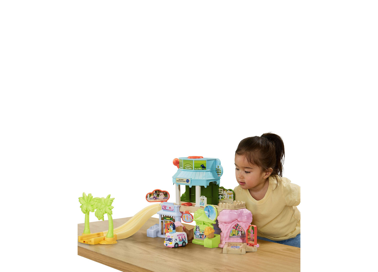 Bluey Ice Cream Adventure Playset with interactive ice cream truck, slide, and colorful buildings