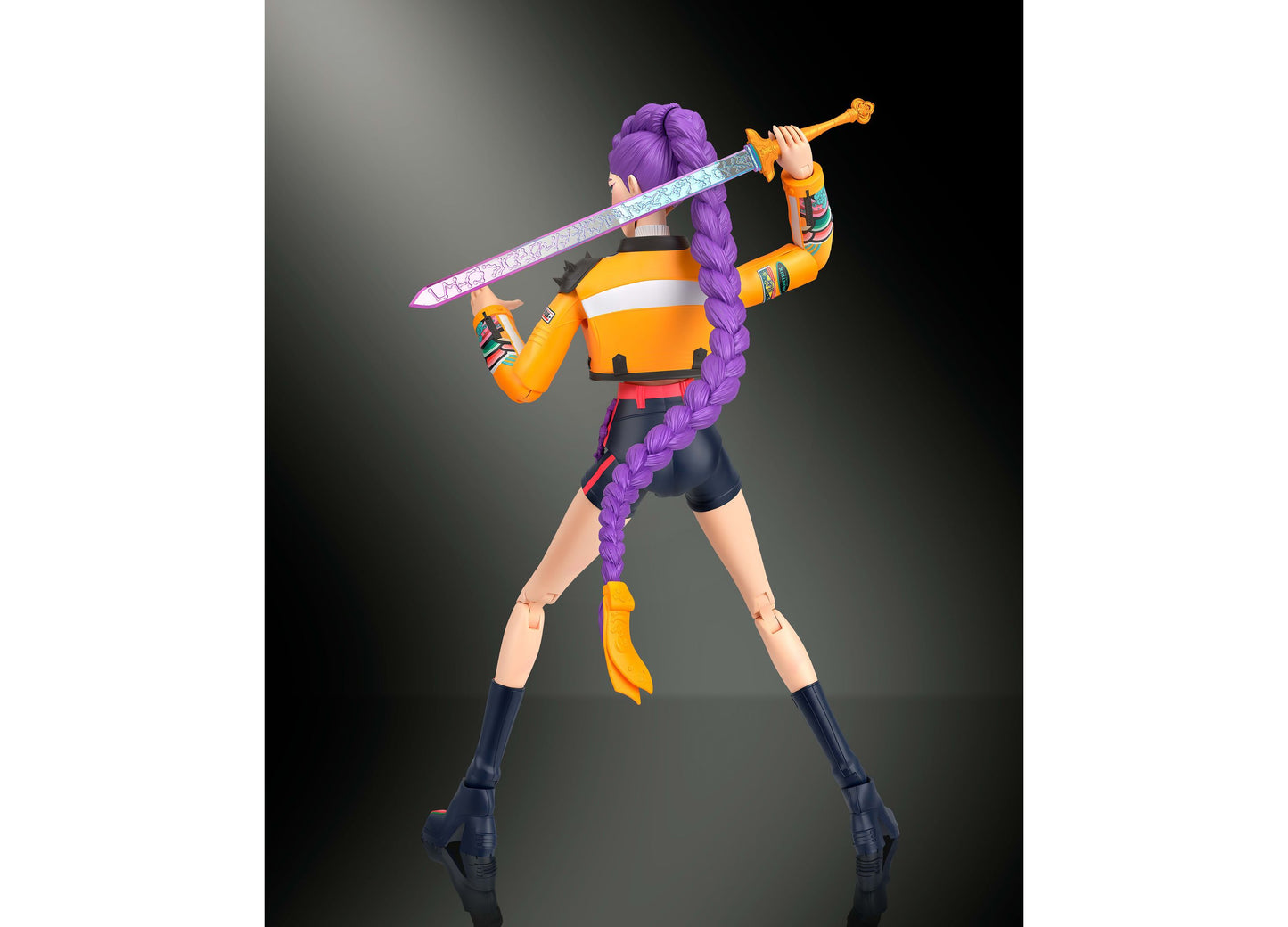 Kpop Demon Hunters Rumi 6-inch action figure with purple hair, orange outfit, articulated joints, and sword