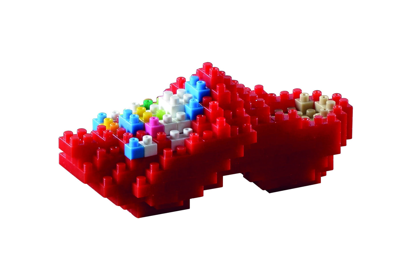 Red building blocks assembled into a pixelated clog shoe shape with multicolored blocks forming a decorative pattern on top