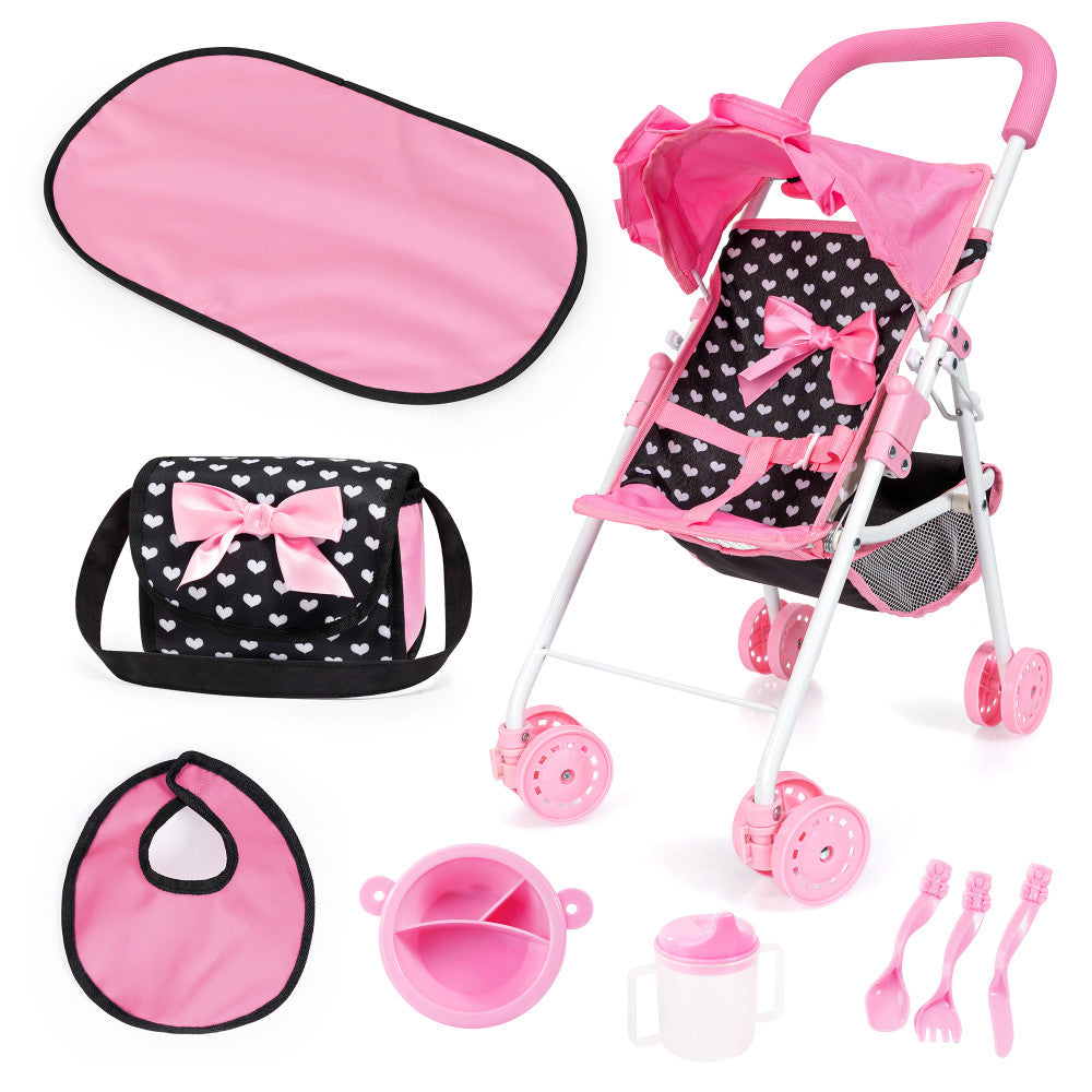 Doll stroller playset with pink canopy and white frame, black seat with white heart pattern and pink bow, includes pink sunshade, black and pink diaper bag, bib
