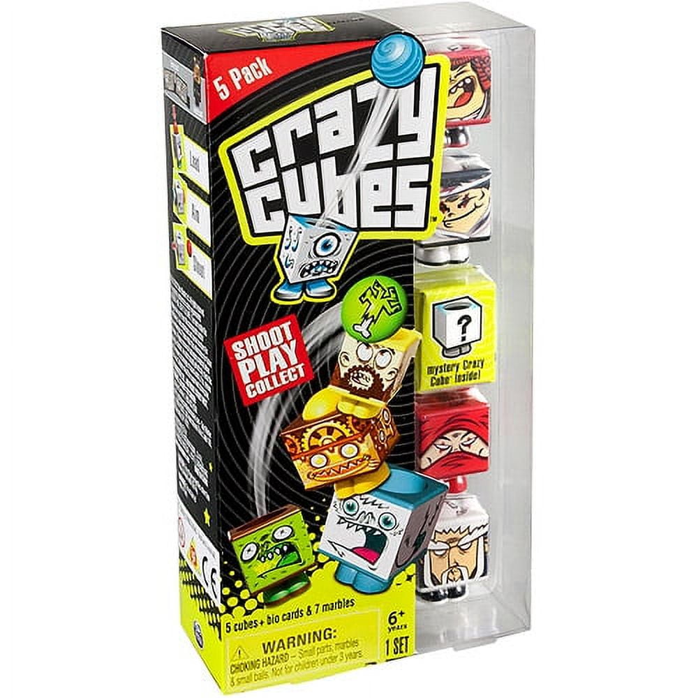 Crazy Cubes 5-Pack Battle Game box showing colorful character cubes, bio cards, marbles, and game pieces with 'Shoot Play Collect' messaging