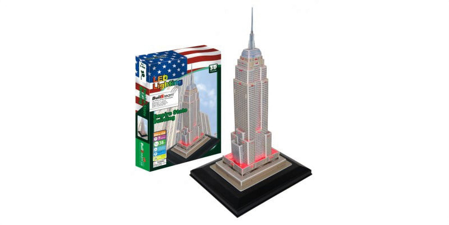 Buildream Empire State Building 3D puzzle with LED lighting on black base, shown assembled next to packaging with American flag design