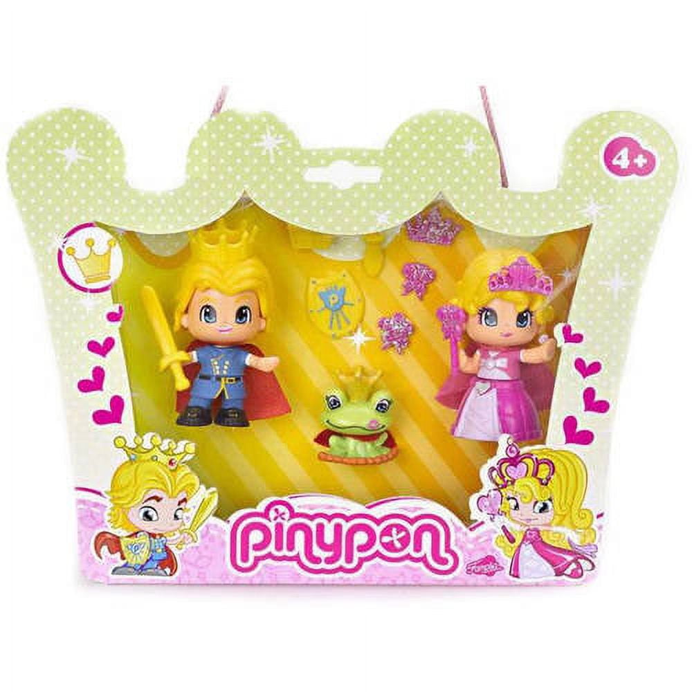 Pinypon Enchanted Royalty Set packaging showing prince and princess dolls in blue and pink outfits with a green frog character and accessories on yellow backgro