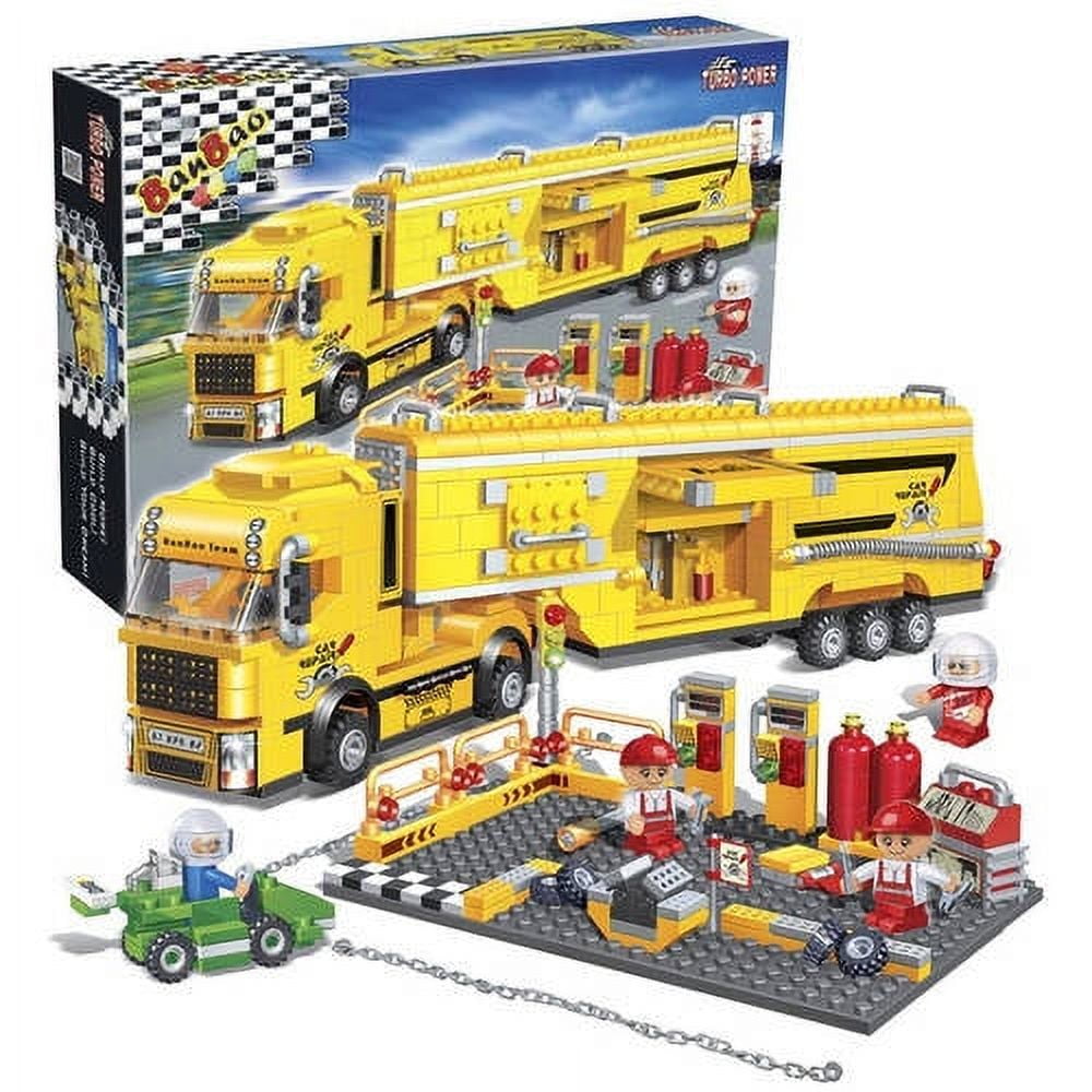 Yellow BanBao building set with racer maintenance truck, figures, service station base with checkered platform, gas pumps, tools, and small green vehicle
