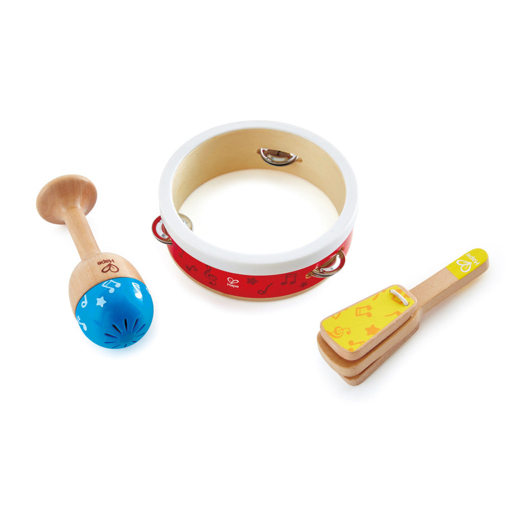 Wooden percussion set with blue ball rattle, red and white tambourine, and yellow wood scraper on white background