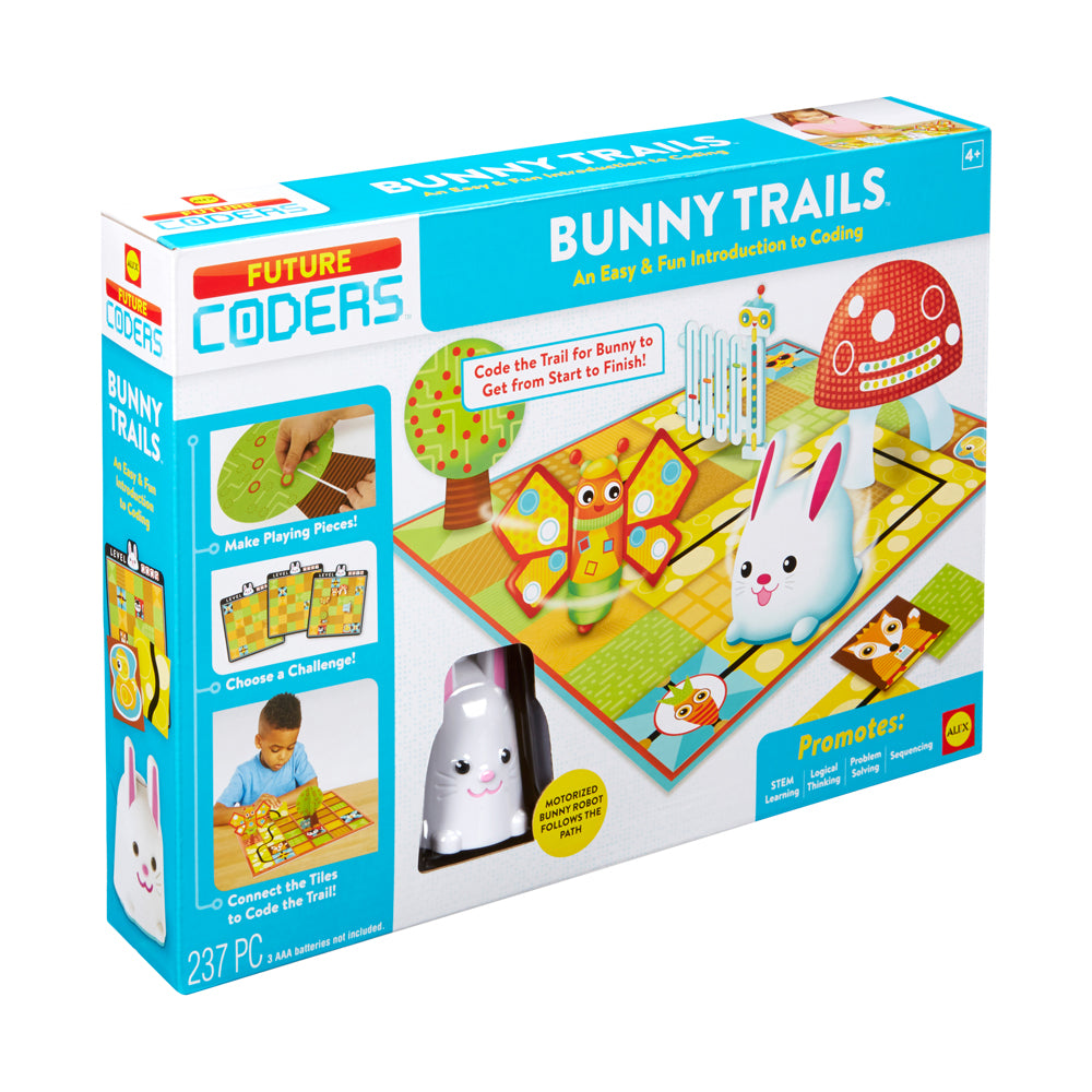 Future Coders Bunny Trails coding game box showing motorized bunny robot, colorful game board with tiles and trails, and product packaging with game pieces