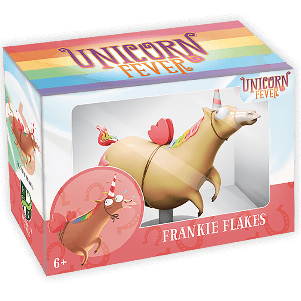 Unicorn Fever Frankie Flakes collectible figure in packaging, showing a tan unicorn with pink wings, striped horn, and party hat