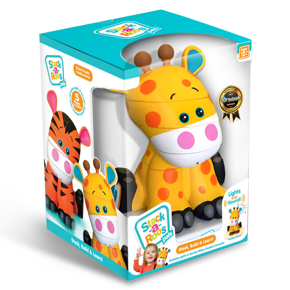 Yellow giraffe stacking toy with white belly, orange spots, brown horns, and blue eyes, shown in turquoise packaging with orange tiger design and Toy Insider aw