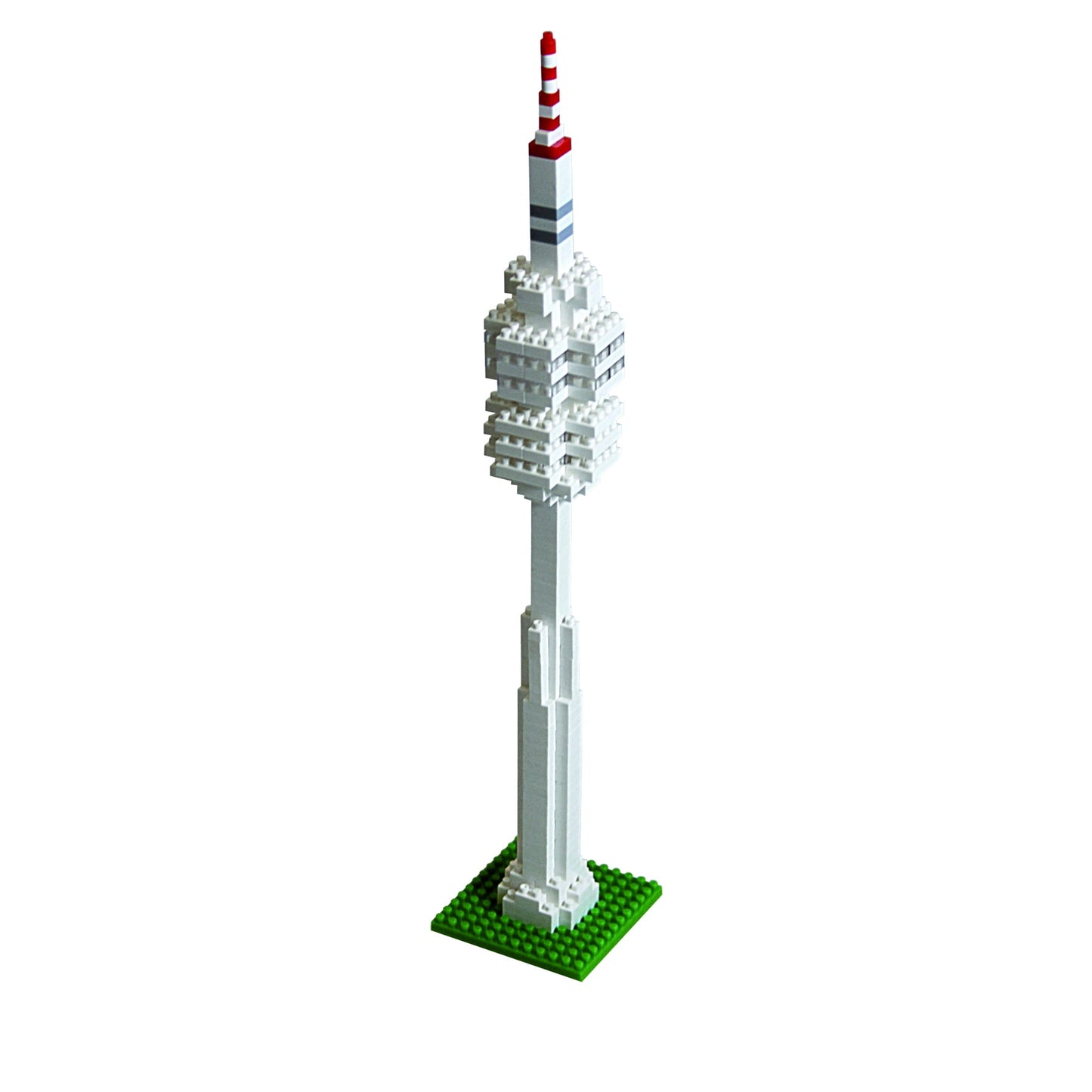 Brixies building kit model of Olympic Tower with white brick structure, red and white striped antenna top, and green baseplate