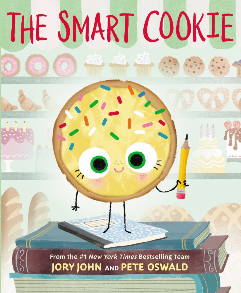 The Smart Cookie by Jory John and Pete Oswald. Book cover featuring an anthropomorphic yellow cookie with large green eyes, colorful sprinkles, and a pencil, st