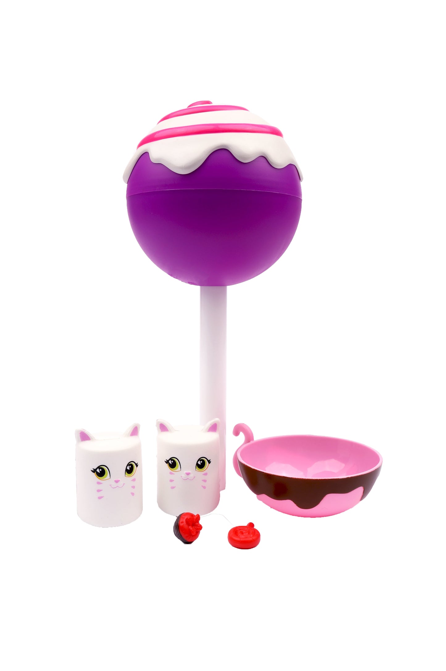 Cakepop Cuties Jumbo Surprise playset with purple lollipop-shaped squishy, two white cat-faced containers, pink bowl, and red fruit accessories