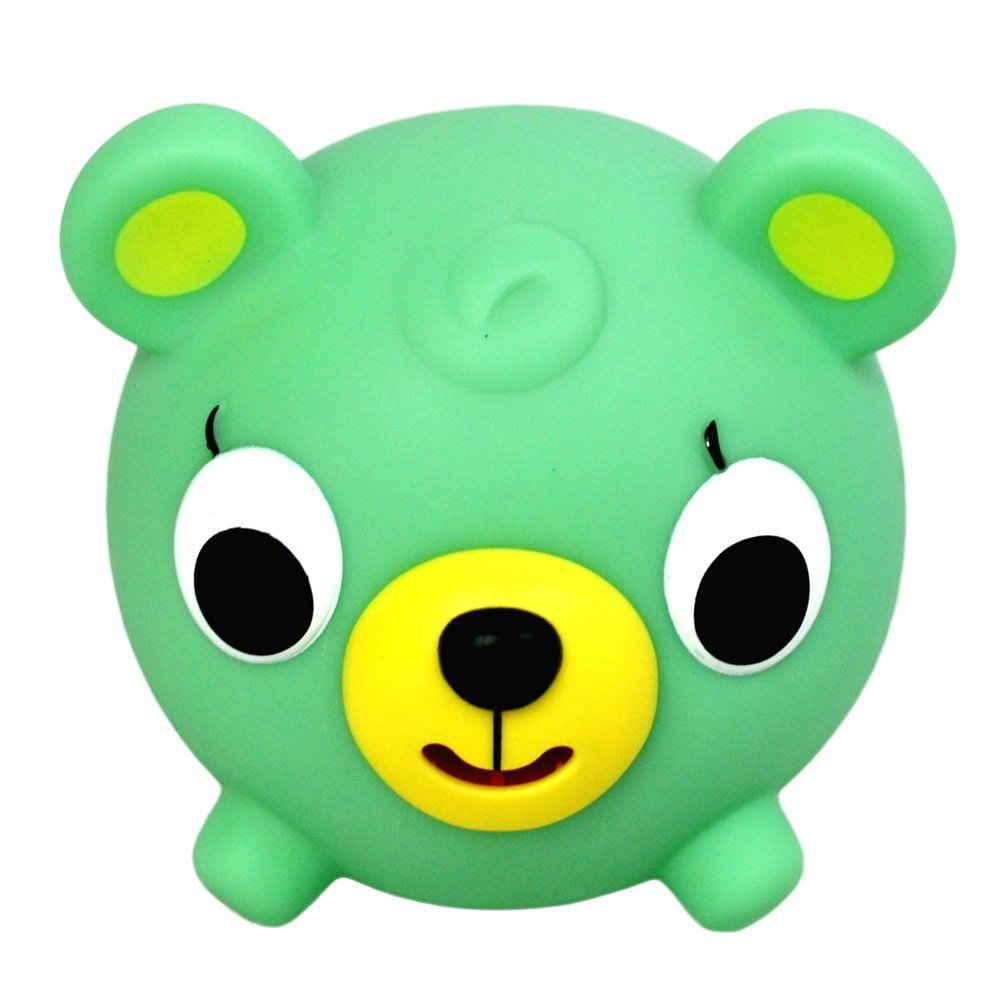 Green plush bear with yellow snout, white eyes with black pupils, yellow ear patches, and small legs, smiling with tongue out