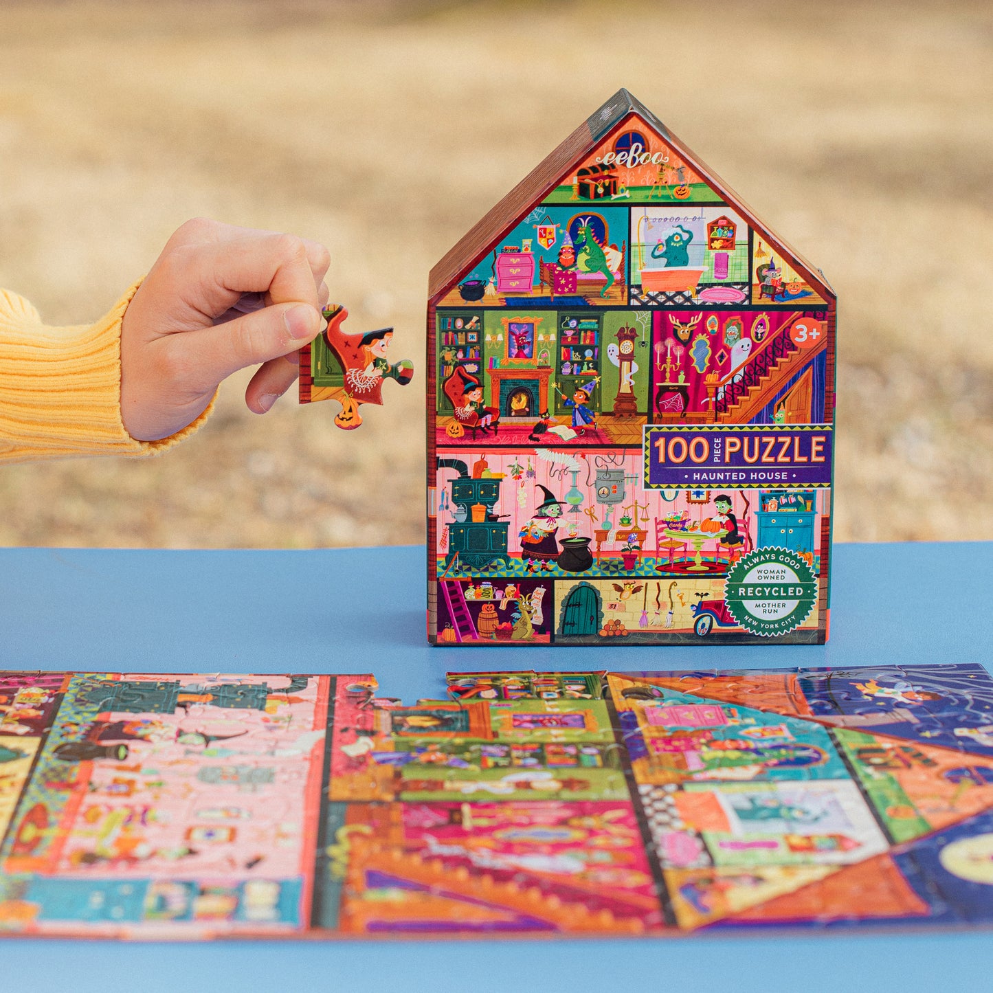 eeBoo Haunted House 100 Piece Puzzle with colorful house-shaped box and puzzle pieces