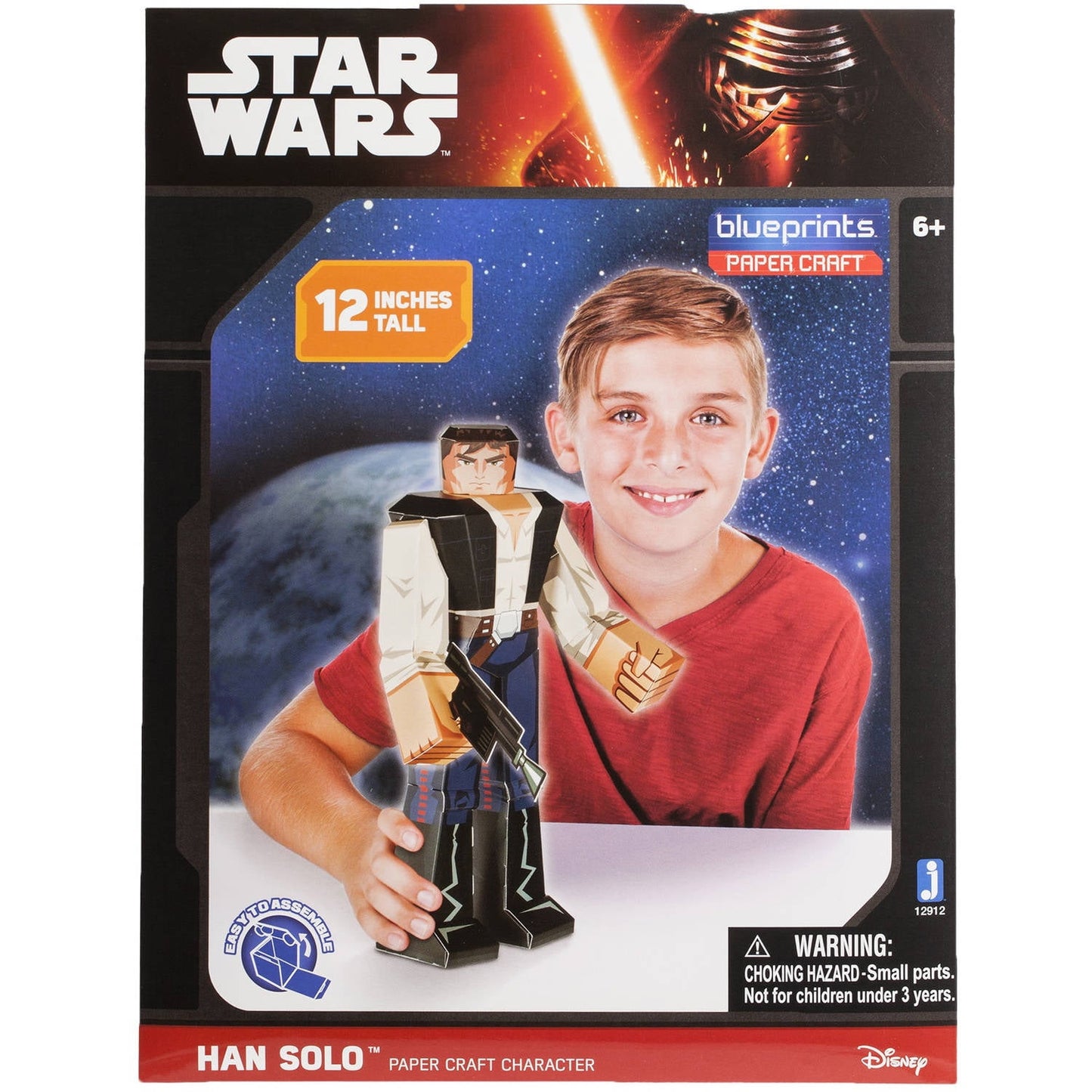 Star Wars Blueprints Paper Craft Han Solo 12-inch tall character, modeled by a child in red shirt holding the assembled paper figure