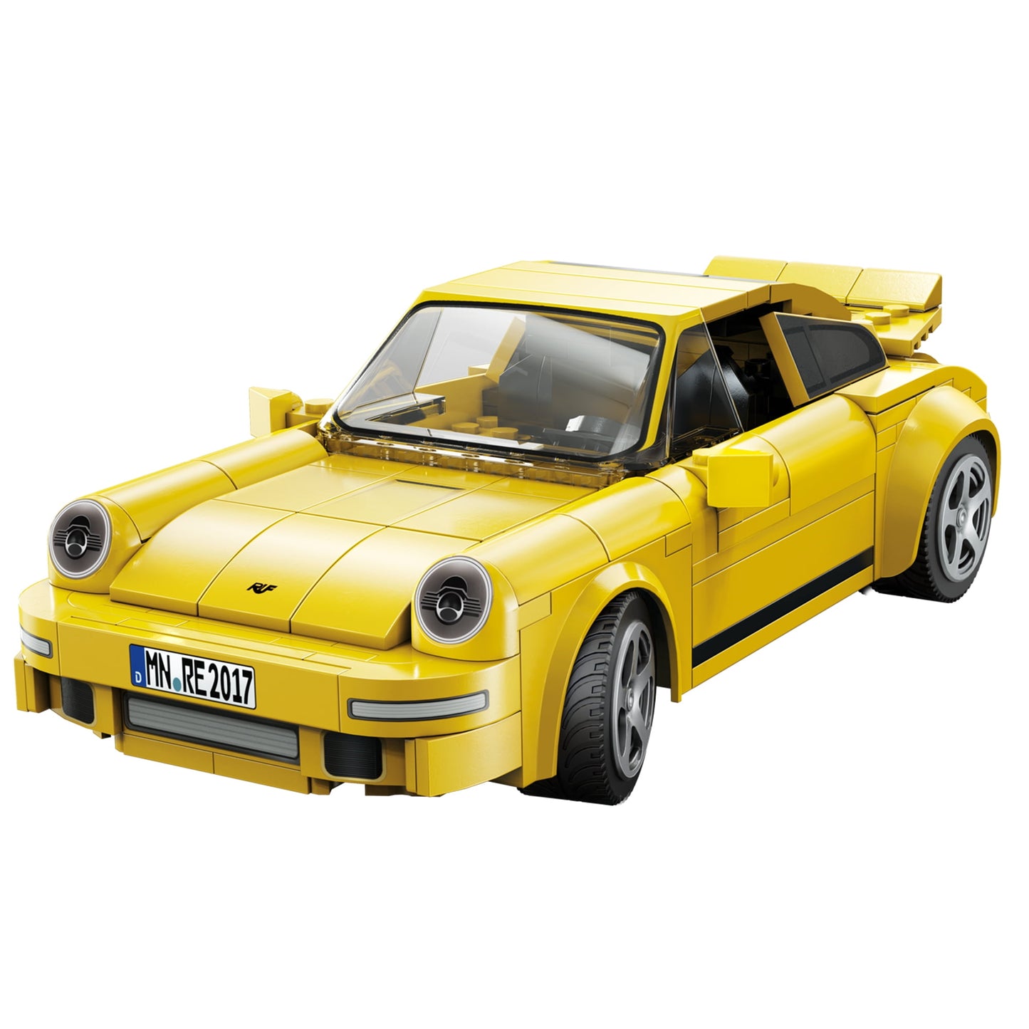 Yellow buildable car model kit with opening doors, detailed engine hood, and removable roof panels on plain background