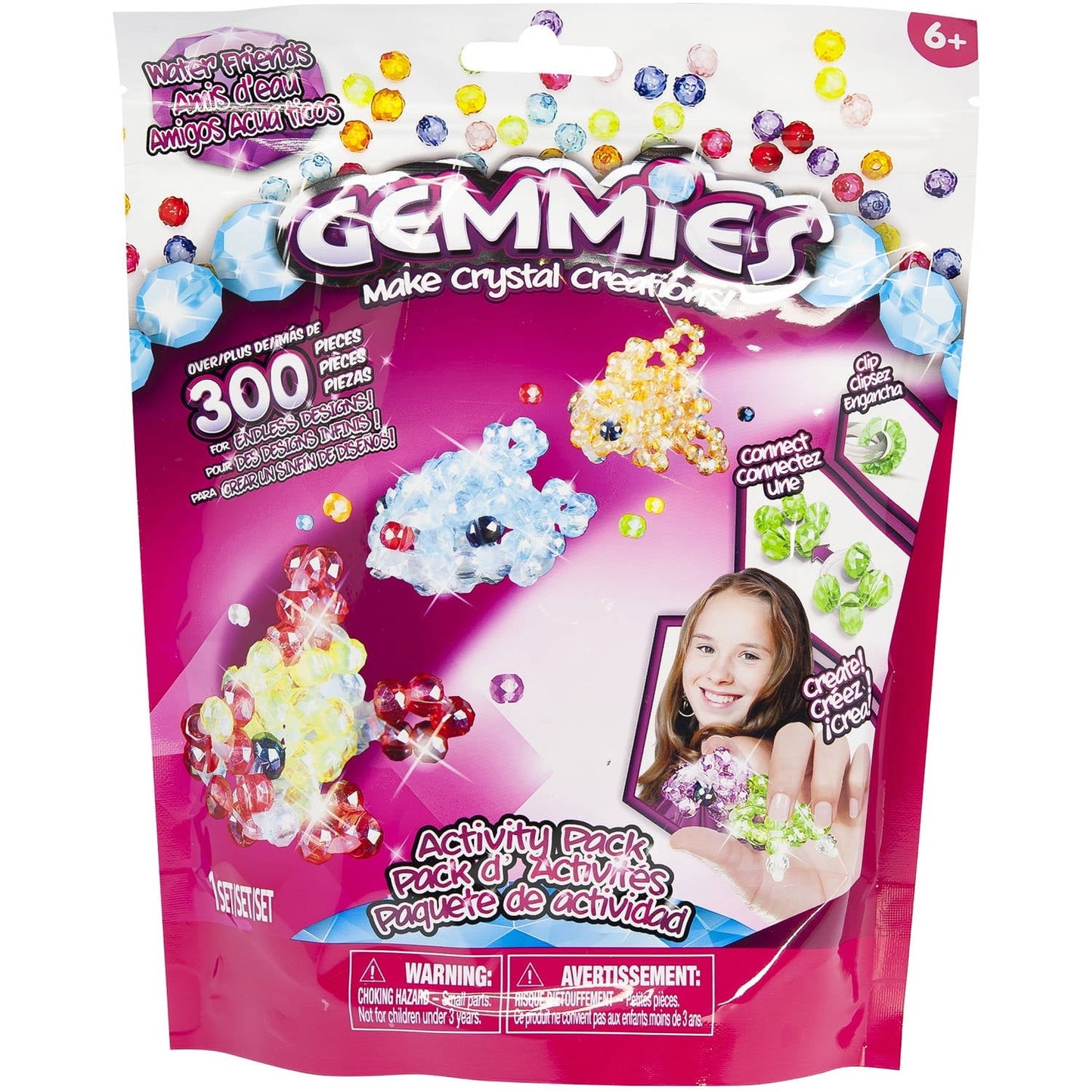 Gemmies Make Crystal Creations Activity Pack with 300+ colorful crystal beads, modeled by a child holding finished crystal creations