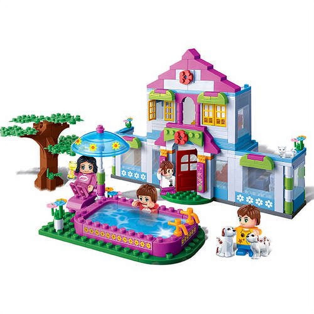 Dream Castle Summer Fun Dream House building set with pink and white castle structure, blue pool with umbrella, tree, and three minifigures with accessories