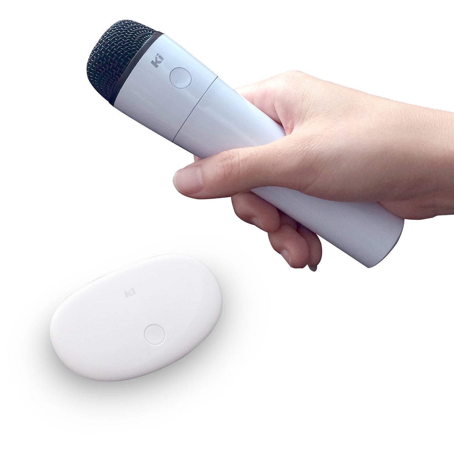 Wireless karaoke microphone in light blue with dark mesh grille held in hand, shown with white charging case below