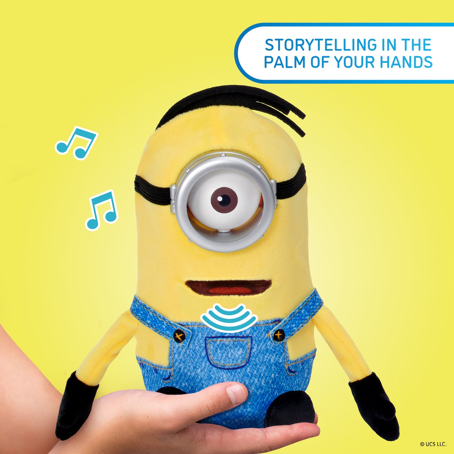 Minions Palm Puppetronic Dick toy in yellow and blue with 40+ sounds, held in hand