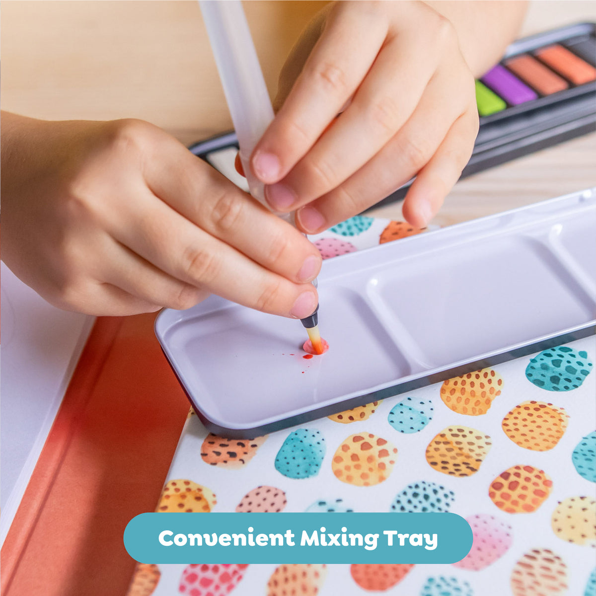 Tiger Tribe watercolor painting set with mixing tray, showing child painting colorful animals with brush