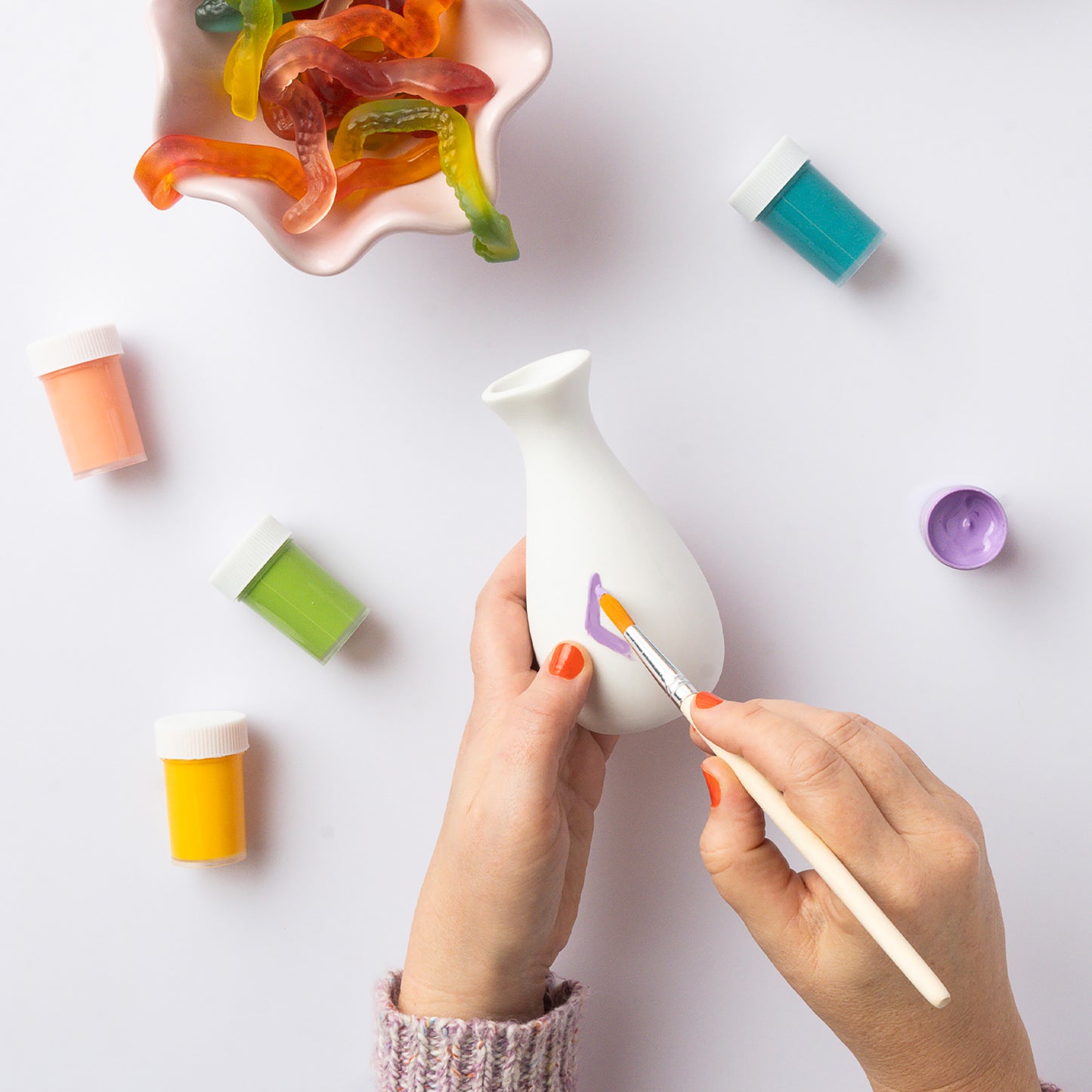 JOS Paint Your Own Vases craft kit with white vase, colorful paints, and brush