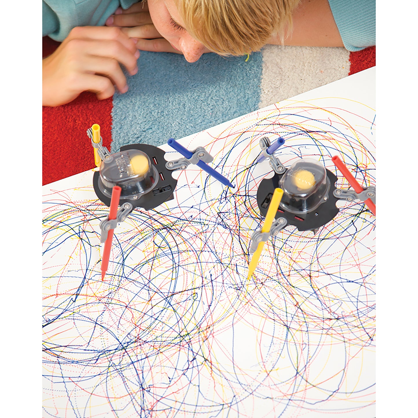 KidzRobotix Doodling Robot with colorful markers creating abstract art
