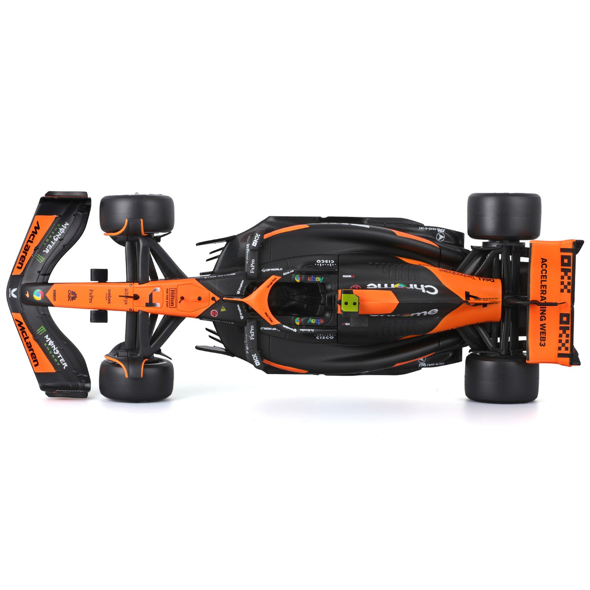 Bburago McLaren MCL38 1:24 scale die-cast race car in orange and black with Lando Norris figure