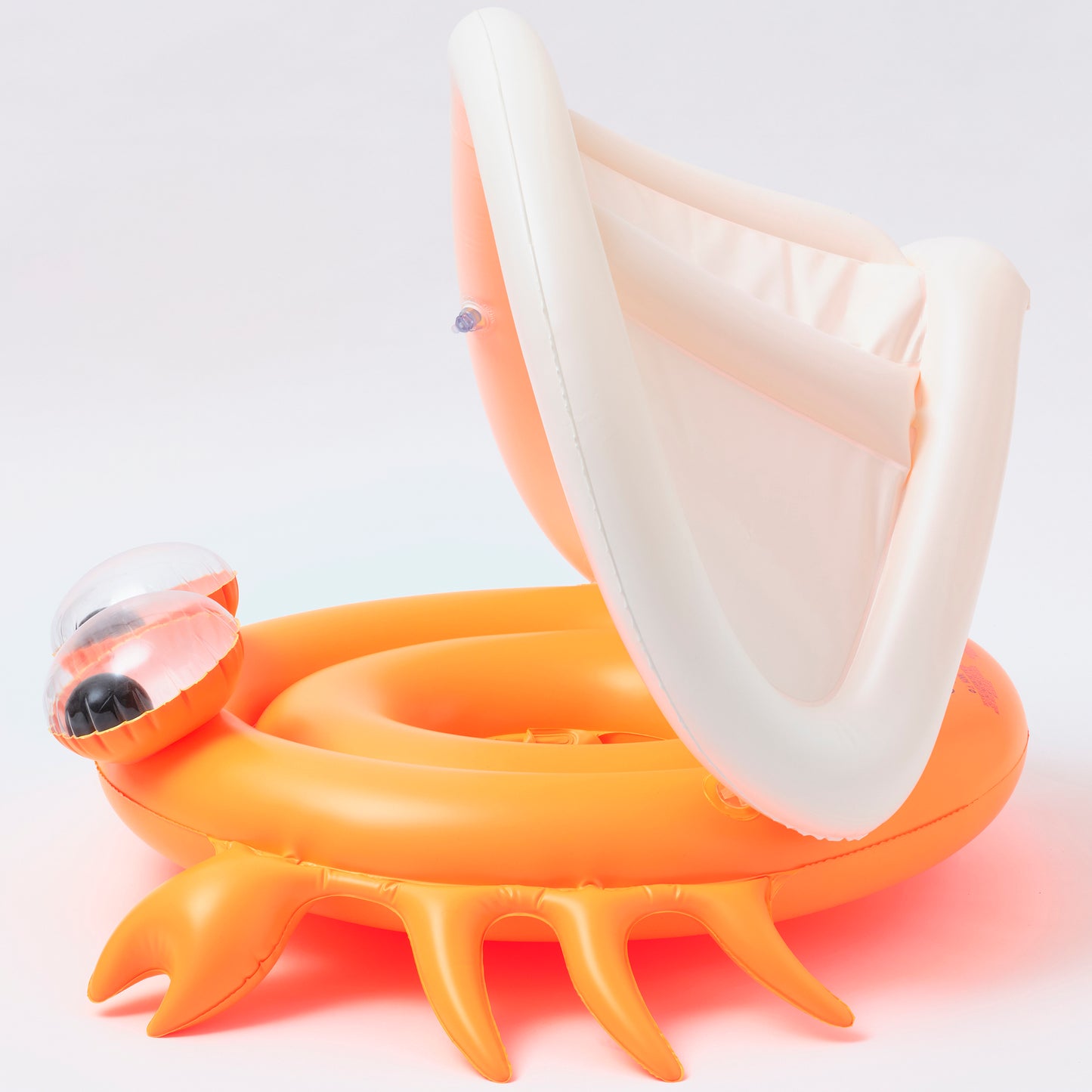 Baby Float Sonny the Sea Creature in neon orange with white canopy and water squirt toy