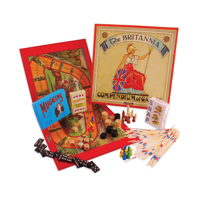 Britannia Compendium of Games vintage 1940s-inspired collection with board games, dice, playing cards, wooden game pieces, and instruction booklets displayed on