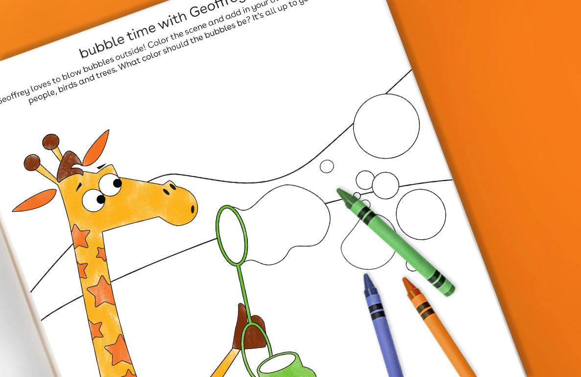 Coloring page featuring Geoffrey the giraffe blowing bubbles, with empty bubble outlines to color and a green bubble wand, blue and orange crayons