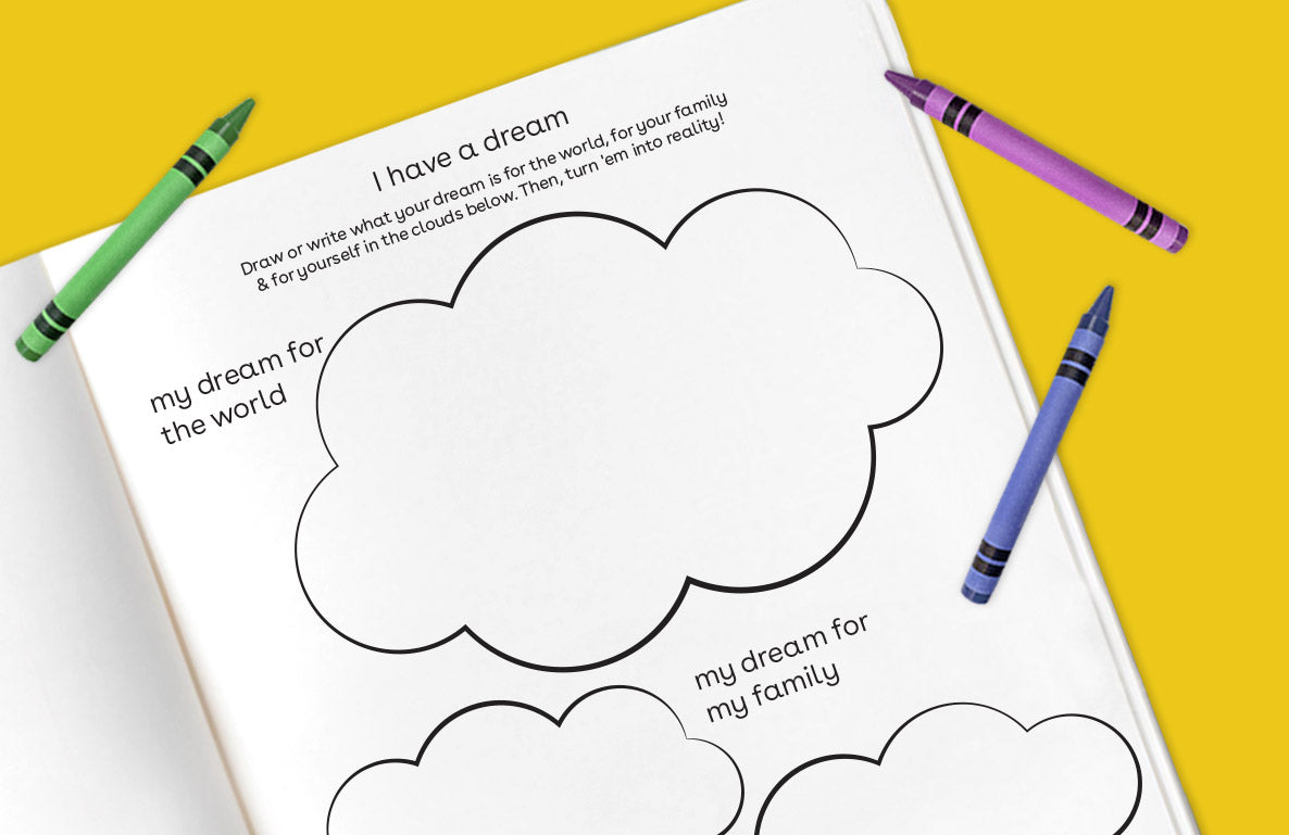 Printable worksheet with cloud-shaped writing prompts titled "I have a dream" on yellow background with green, purple, and blue crayons