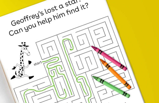 Printable maze activity sheet featuring a giraffe character named Geoffrey with the text "Geoffrey's lost a star! Can you help him find it?" surrounded by three