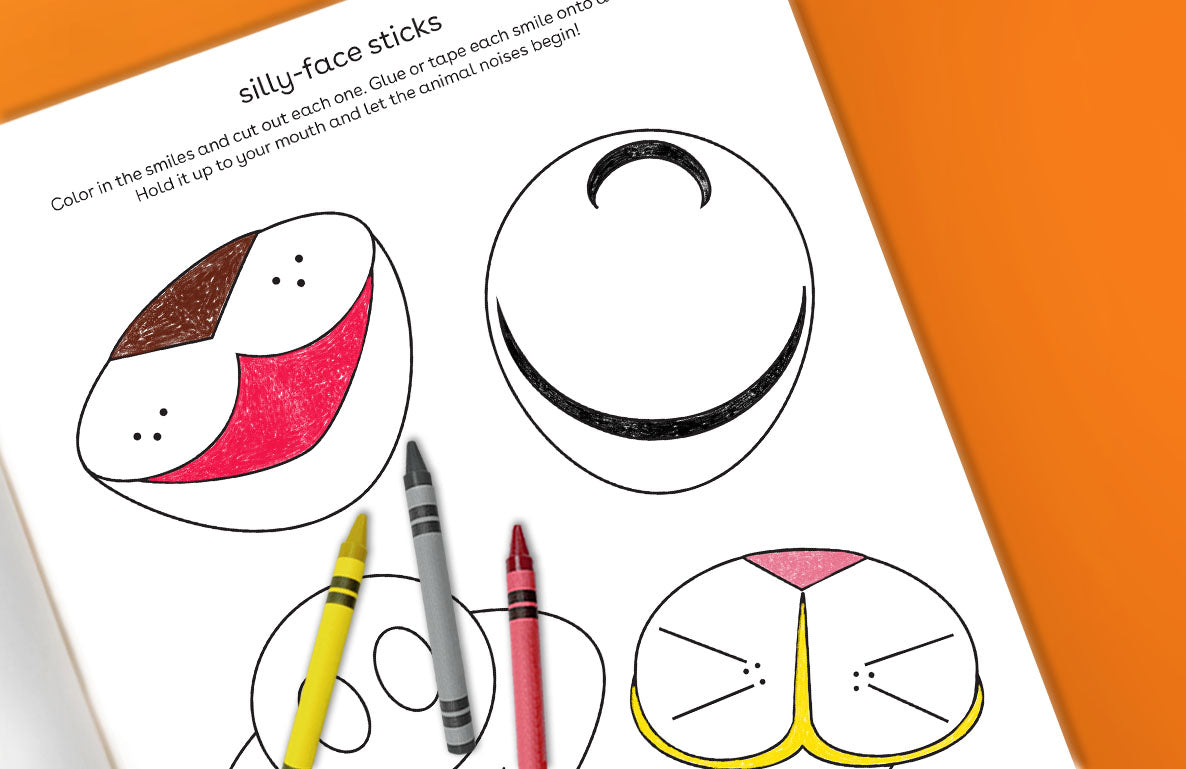 Printable activity page titled "silly-face sticks" showing four outlined face templates with different expressions to color in, accompanied by crayons