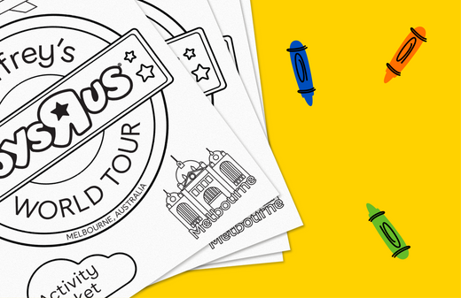 Coloring pages and activity sheets featuring Geoffrey's World Tour Melbourne theme on white paper, displayed next to three colored markers on bright yellow back