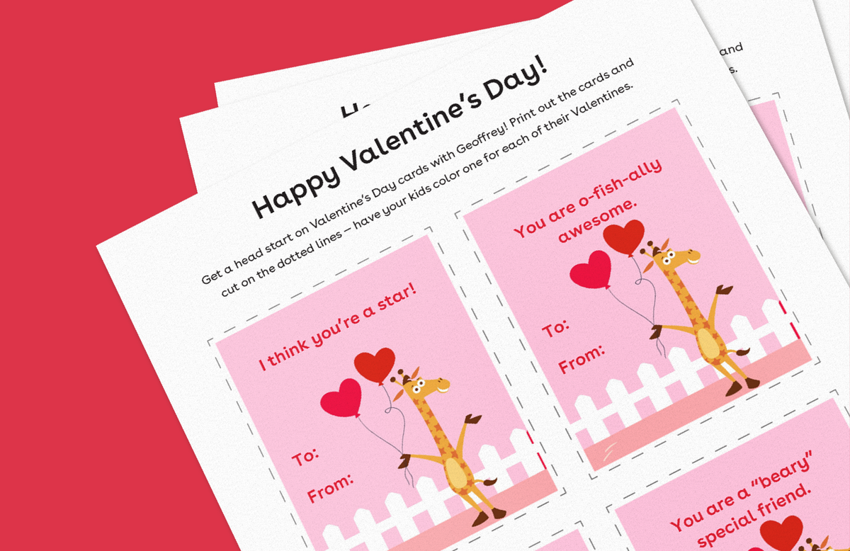 Happy Valentine's Day printable cards featuring a smiling giraffe with red hearts on a pink background, with spaces to write recipient and sender names