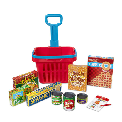 Melissa & Doug Fill & Roll Grocery Basket Play Set with red basket, blue handle, and 11 food items