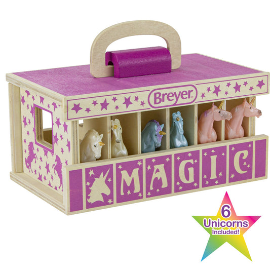 Breyer wooden stable playset with purple roof and handle, decorated with stars and unicorn silhouettes, containing 6 colorful unicorn figurines in storage compa