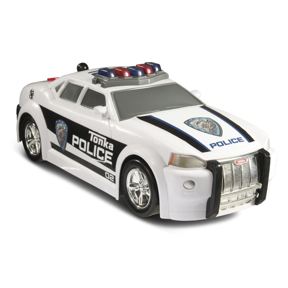 Tonka Mighty Motorized white and black police cruiser toy with lights on roof and grille detail on plain background