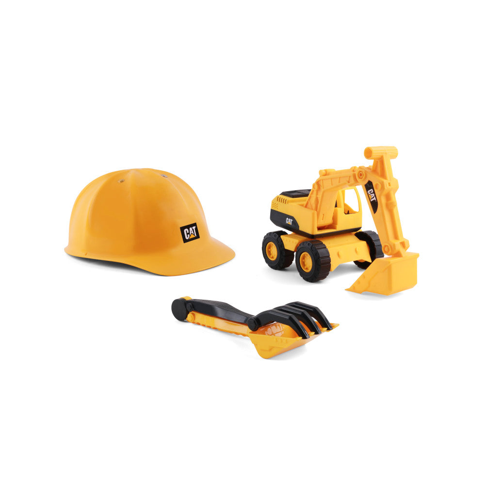 CAT construction set with yellow hard hat, toy excavator with black wheels and bucket, and yellow shovel with black grip on plain background
