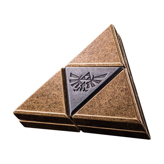 Gold and bronze triangular metal puzzle with Triforce emblem from The Legend of Zelda, shown assembled on plain background