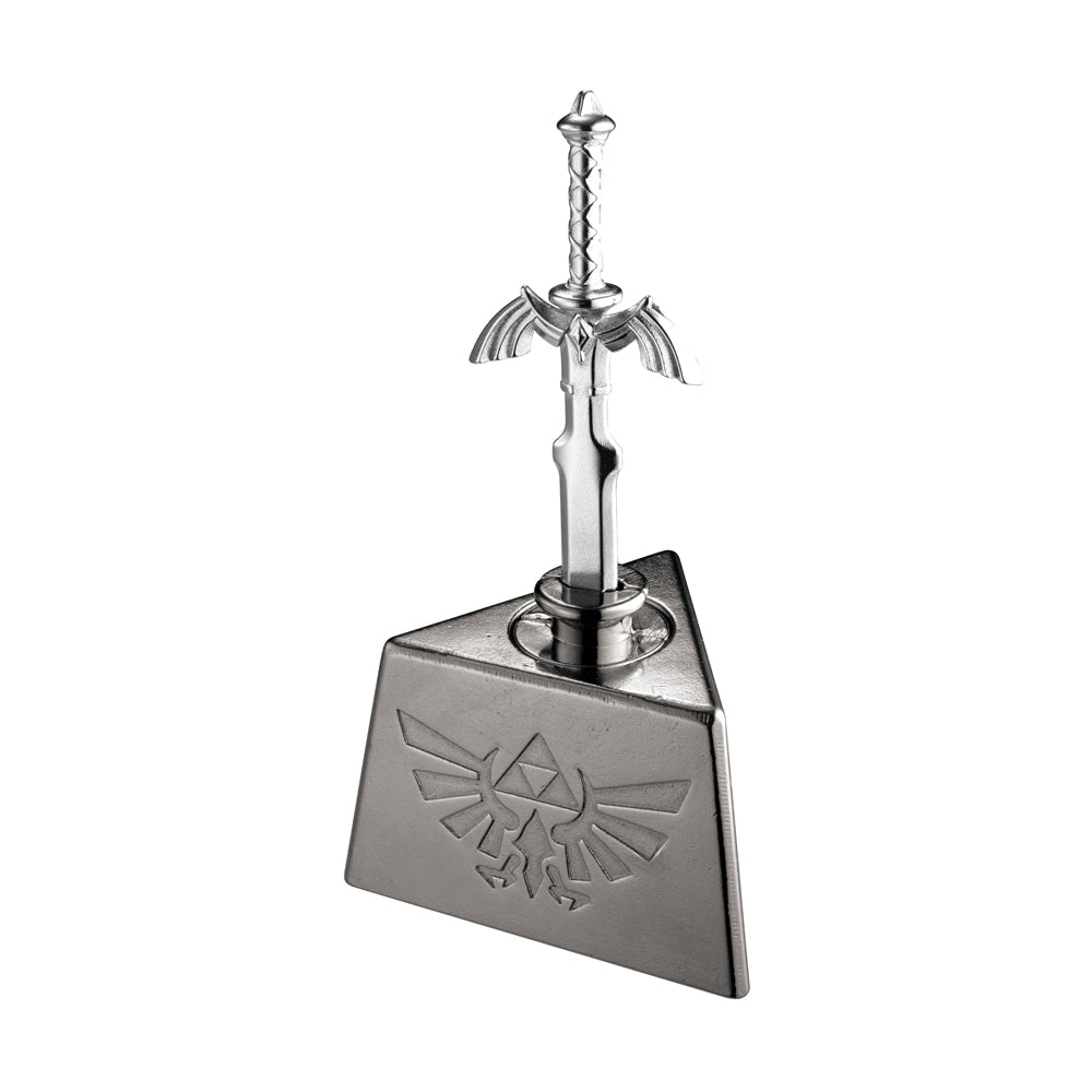 Master Sword from The Legend of Zelda with Triforce shield stand, silver metal puzzle displayed on plain background
