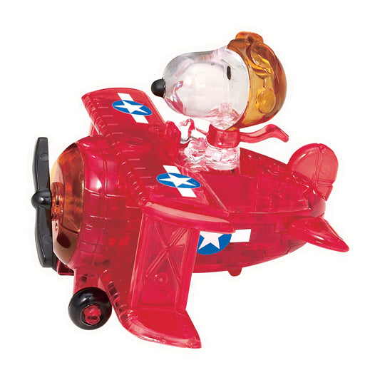 Red airplane toy with Snoopy character figure piloting, featuring blue and white star markings and amber-tinted windshield and propeller