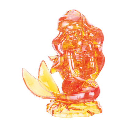 Translucent red and yellow 3D crystal puzzle assembled into Ariel the mermaid figure with tail fin