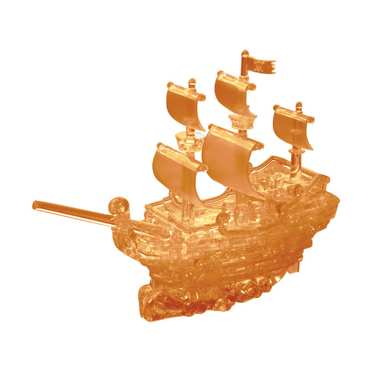 Translucent amber 3D crystal pirate ship puzzle assembled and displayed on plain white background