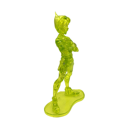 Neon yellow-green 3D crystal puzzle figure of Peter Pan standing on a curved base platform